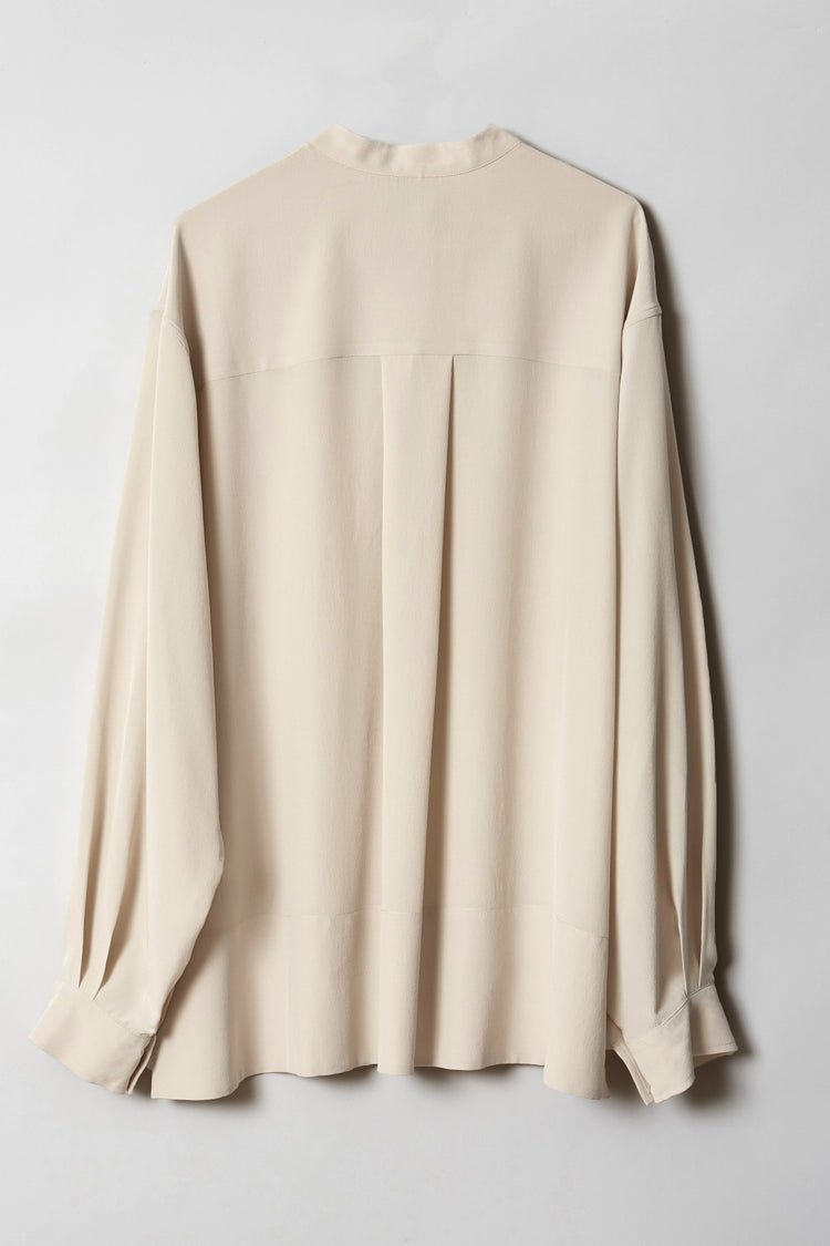 Back view of HELEN oversized silk blouse highlighting the dropped shoulders and flowing silk crêpe de chine fabric.