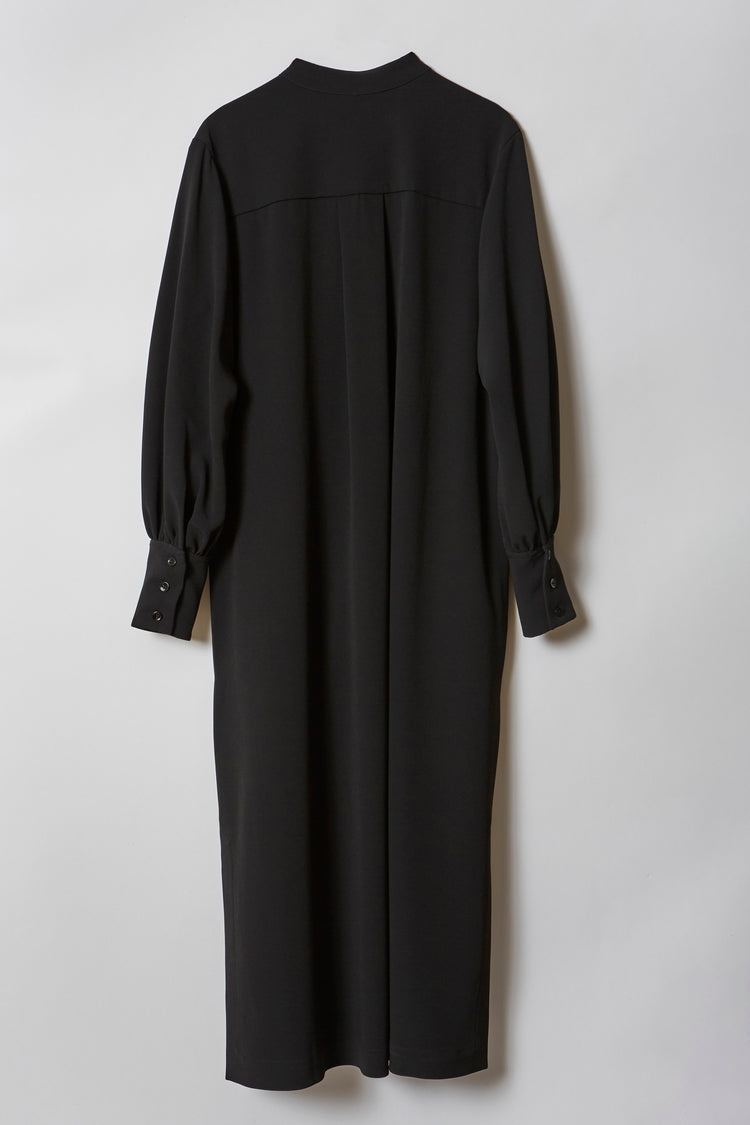 Back view of JOYCE midi dress highlighting the relaxed silhouette and standing collar.